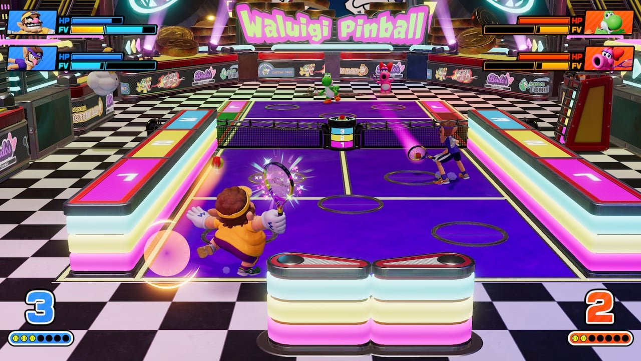 default-549 video game screenshot of Mario characters playing tennis on a large pinball table.